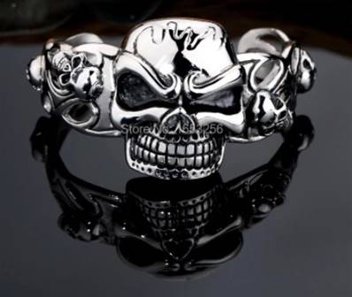 Bracelet inox grosse tete de mort , + 4 pt skull